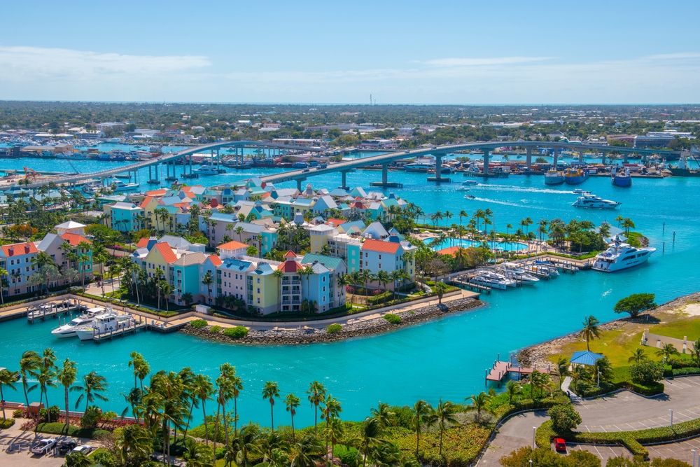 Harborside Villas aerial view at Nassau Harbour with Nassau downtown at the background, from Paradise Island, Bahamas.
