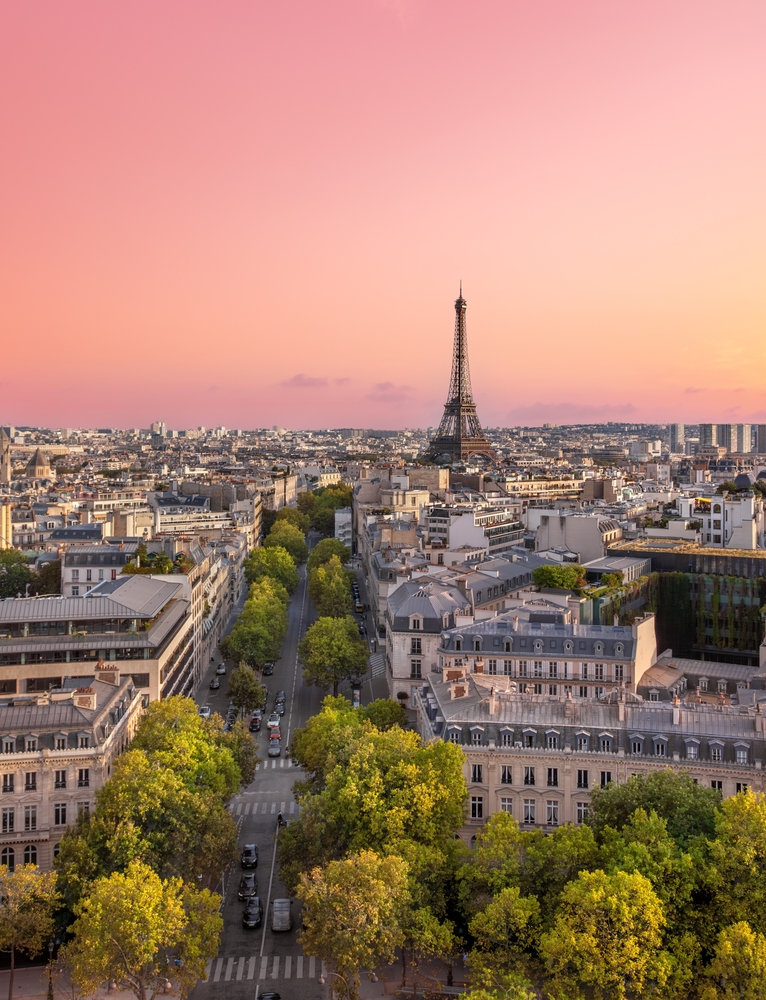 Cityscape of Paris with Eiffel Tower. The article is about cheapest places to fly from Florida.